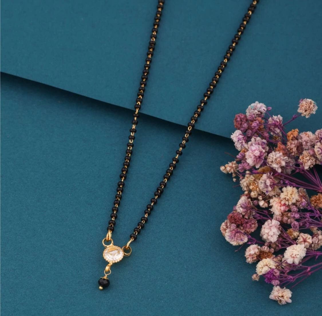 Elegant Gold-Plated Mangalsutra & Jhumki Set